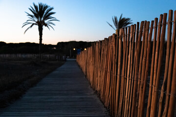  Lights during the sunset over the way to the El Prat de Llobregat beach in Barcelona, Spain.