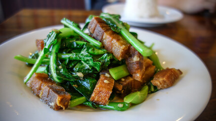 Fried chopped pork with Chinese kale