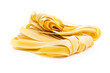 Uncooked pappardelle pasta isolated on white background.