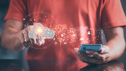 Wall Mural - a young businessman uses a smartphone and touches the cloud through a virtual screen. , communicatio