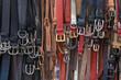 Closeup of many belts leather colorful vibrant colors pattern hanging on display in shopping street market in Firenze, Florence, Italy in Tuscany