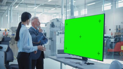 Poster - Factory Office Meeting: Chief Engineer Talking with Business Partner in a Conference Room with TV with Green Screen Mock Up Display. Concept for Heavy Industry and Manufacturing Related Templates.