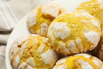 Tasty homemade lemon cookies on plate, closeup