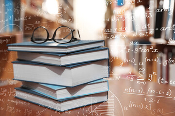 Science and education concept. Illustration of basic physics and mathematics formulas and stack of books with glasses on table in library