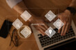 © New Africa - Internet marketing. Different virtual icons and businessman working on modern laptop at table, top view