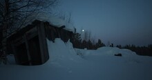 Old Destroyed Wooden Toilet Among The Winter Forest Under The Moon.