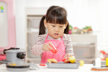 Sticker - young  girl pretend play food preparing at home