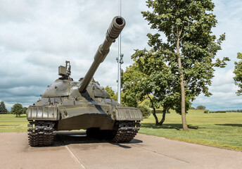 Tank. Military defense, war concept. Weapon used by army in ground combat. Monument in memory of Second World War soldiers. High quality photo