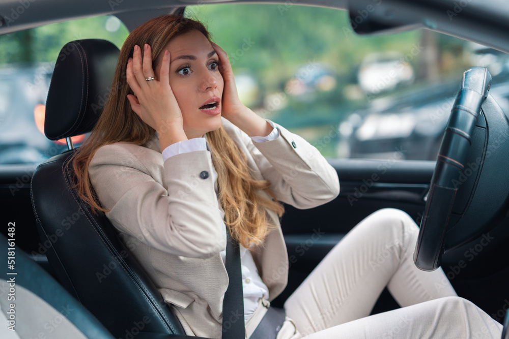 First Driver Scare Woman driver scared shocked before crash or accident hands on wheel on ...