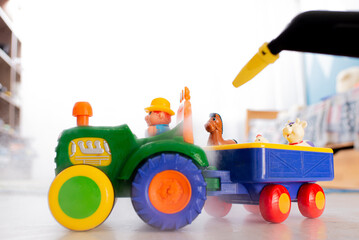 Wall Mural - Steam cleaning of children's toys. Steam cleaner