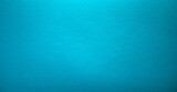 Fototapeta Sport - Photo of the turquoise background texture. Soft felt fabric of the color of the sea wave. A clean background for the text. Blue background for banner-shaped text.The color of the sea.