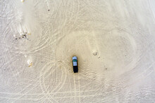Aerial View Directly Above Of A Pickup Truck In The Nevada Desert Near Sand Mountain Recreation Area.