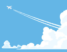 夏空の入道雲の向こうに飛んでいくジェット機と飛行機雲　背景・壁紙