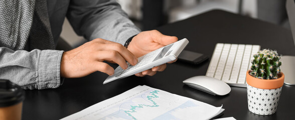 Poster - Male accountant working in office, closeup