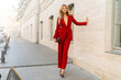 © Svetlana Sokolova - Fashion photo of beautiful blond woman   in stylish  luxury velvet suit posing outdoor.  Full lenght.