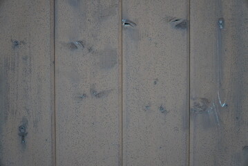 Wall Mural - Texture of an old fence made of wooden boards close-up