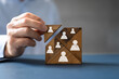 Leinwandbild Motiv HR Recruitment Hand Making Tangram Puzzle