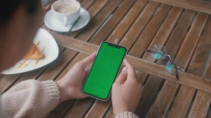 Aufkleber - Close-up women using phone green screen in the morning