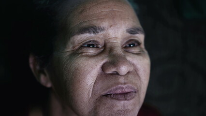 Wall Mural - One older hispanic black woman portrait face closeup. A senior South American elder