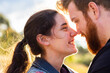 © Austockphoto - Happy smiling couple with noses touching close together