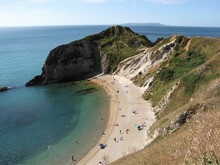Beautiful Natural Bay With Blue Sea Water At The English Jurassic Coast Of The Durdle Door