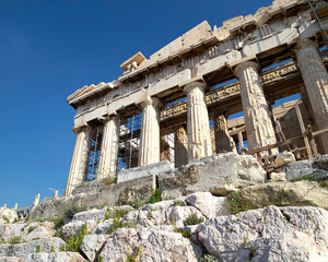 Wall Mural - A partial view of the west front of Parthenon Greek temple is on Acropolis hill. One of the seven wonders of the ancient world. Cultural travel in Athens, Greece.