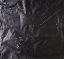 Abstract Background Made Of Black Plastic Film