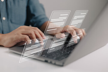 Leinwandbilder - A businessman works on a laptop with electronic document icons, E-document management, and a paperless workplace.