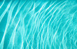© Trinette Reed/Stocksy - Blue ripples in pool water