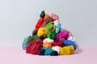 © French Anderson Ltd/Stocksy - Large pile of colourful messy plasticine