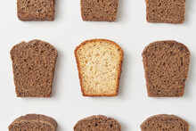 Freshly Baked White And Brown Bread Sliced Into Pieces