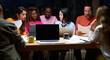 © Guille Faingold/Stocksy - Multiracial teamwork at overtime office