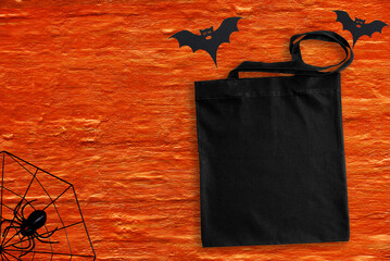 Black tote bag mockup Mockup on orange background. Halloween mock ups.