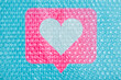 © Simone Wave/Stocksy - Packaging social Like icon with bubble wrap