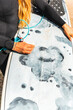 © Manu Prats/Stocksy - Surfer woman waxing surfboard