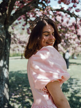 Girl In Pink Dress Puff Sleeves Smiling