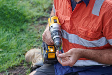 Tradie Attacking A Drill Bit
