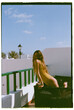 © Berena Alvarez/Stocksy - beautiful blonde woman on the terrace of her hous