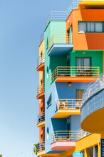 Colorful Residential Building Under Blue Sky In Albufeira Harbor