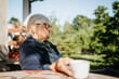 © Dimitrije Tanaskovic/Stocksy - Woman With Cup Of Coffee