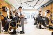 © Hernandez & Sorokina/Stocksy - Two Barbers Working With Their Clients