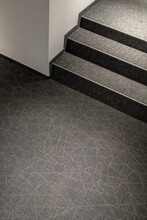 Corridor In Contemporary Style With Textured Carpeting