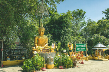 Wall Mural - Atmosphere inside religious tourist attractions at Maha Chedi Tripob Trimongkol with large stainless steel pagoda. Photo from Phra Maha That Chedi Triphop Tri Mongkhon, Hat Yai, Thailand 