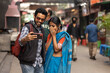 © Dream Lover/Stocksy - Indian couple taking selfie and enjoying at outdoors in daytime