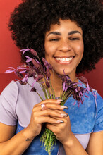 Hispanic Woman Holding A Bouquet Of Fresh Lavender