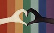 © Valeriya Simantovskaya/Stocksy - Illustration of two heart shaped hands. LGBT