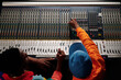 © Clique Images/Stocksy - Using Mixing Console In Recording Studio