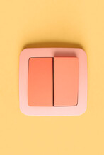 Top-down View Of A Pink Light Switch