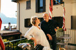© Michela Ravasio/Stocksy - Happy mature couple on the balcony