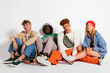 © BONNINSTUDIO/Stocksy - Diverse trendy youngsters in studio